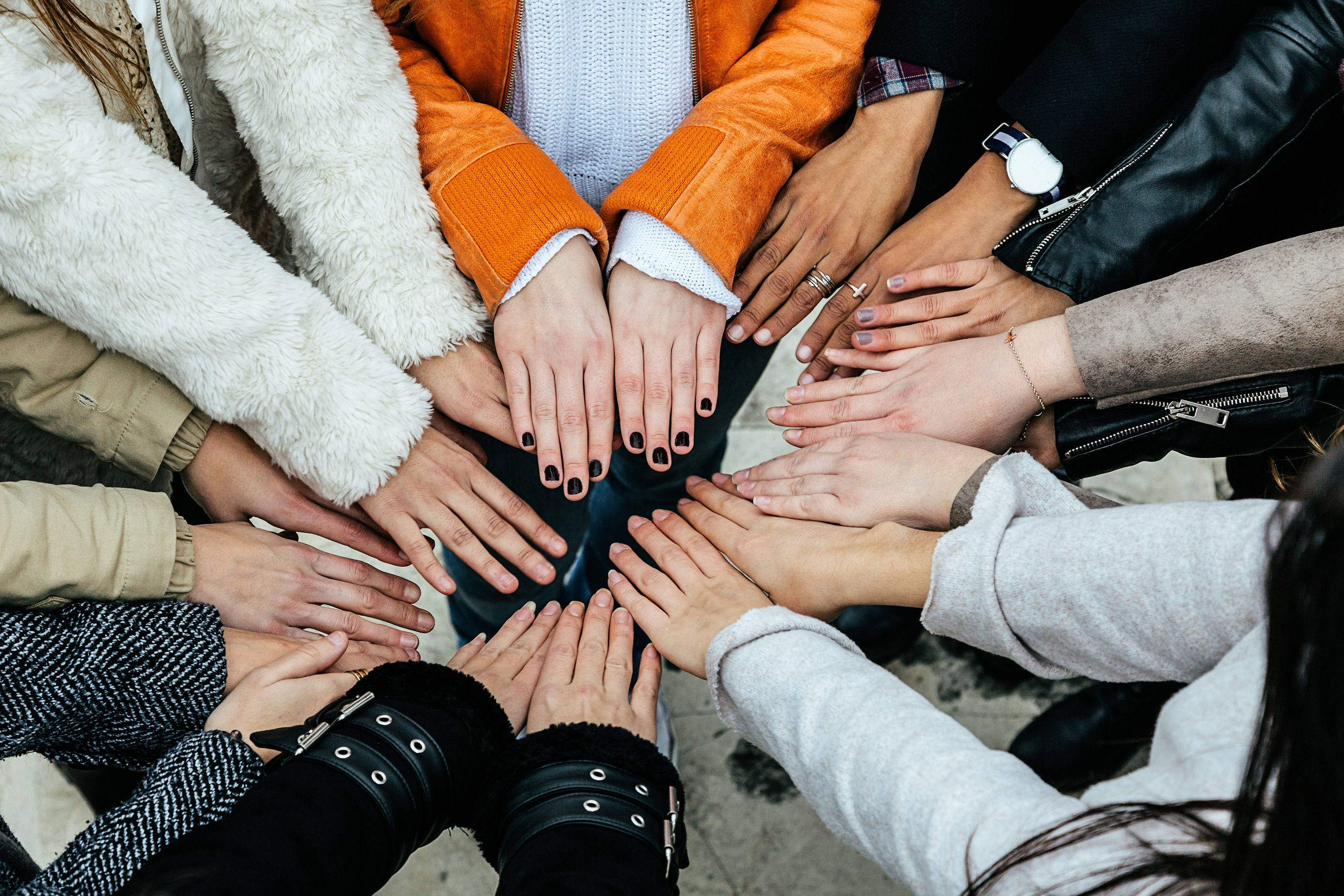 Hands In hands together in a circle