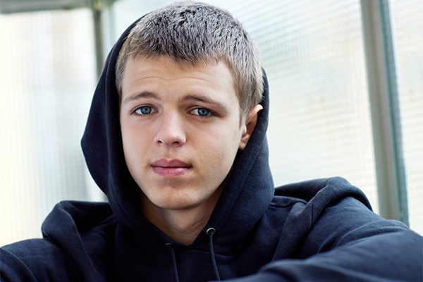 Teen boy in hoodie