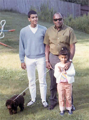 Michele, Vern, Uncle, and Dog in backyard
