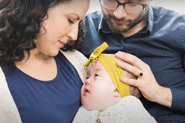 Parents holding baby Parents holding baby