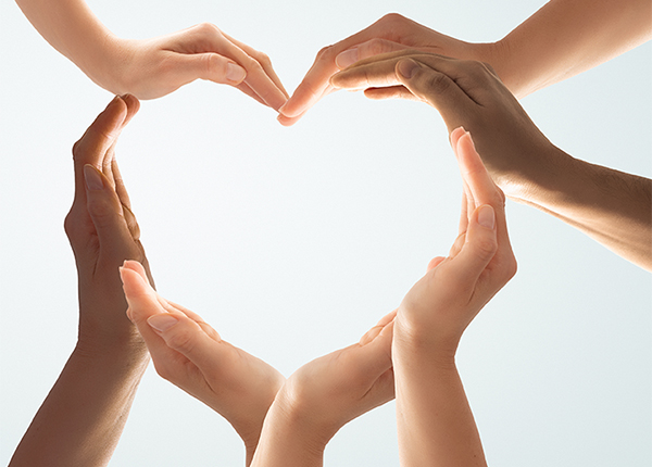 Heart Several hands shaped into a heart