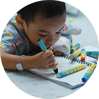 Small child in hospital gown
