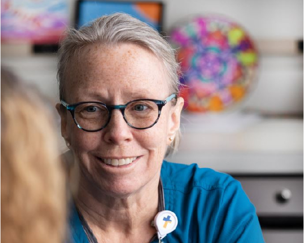 Circle of Caring Smiling caregiver