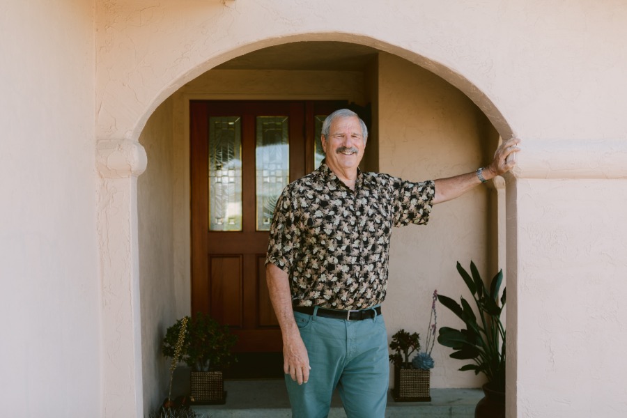 wtg-planning Man standing in doorway of house
