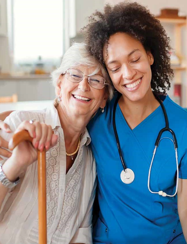 Caregiver and patients Caregiver hugs elderly patient