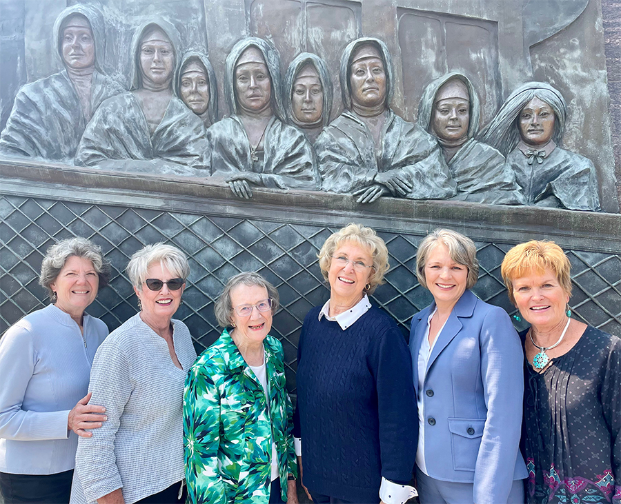 Women for Wellness Five women posed in front of hospital