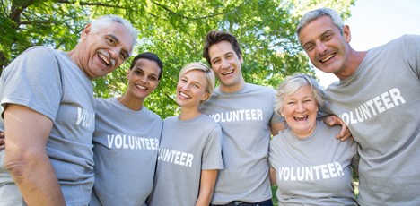 Volunteers Diverse group of men and women wearing